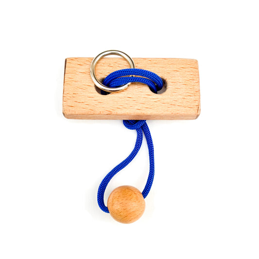 Wooden disentanglement String puzzle with Blue rope, ball, and ring on white background