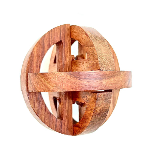 Wooden puzzle ball in the shape of a dodecahedron with geometric patterns on a white background